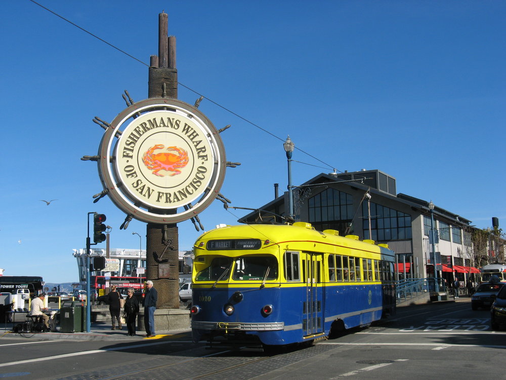 Fisherman's Wharf - Crab Wheel Sign and Street Car.jpg